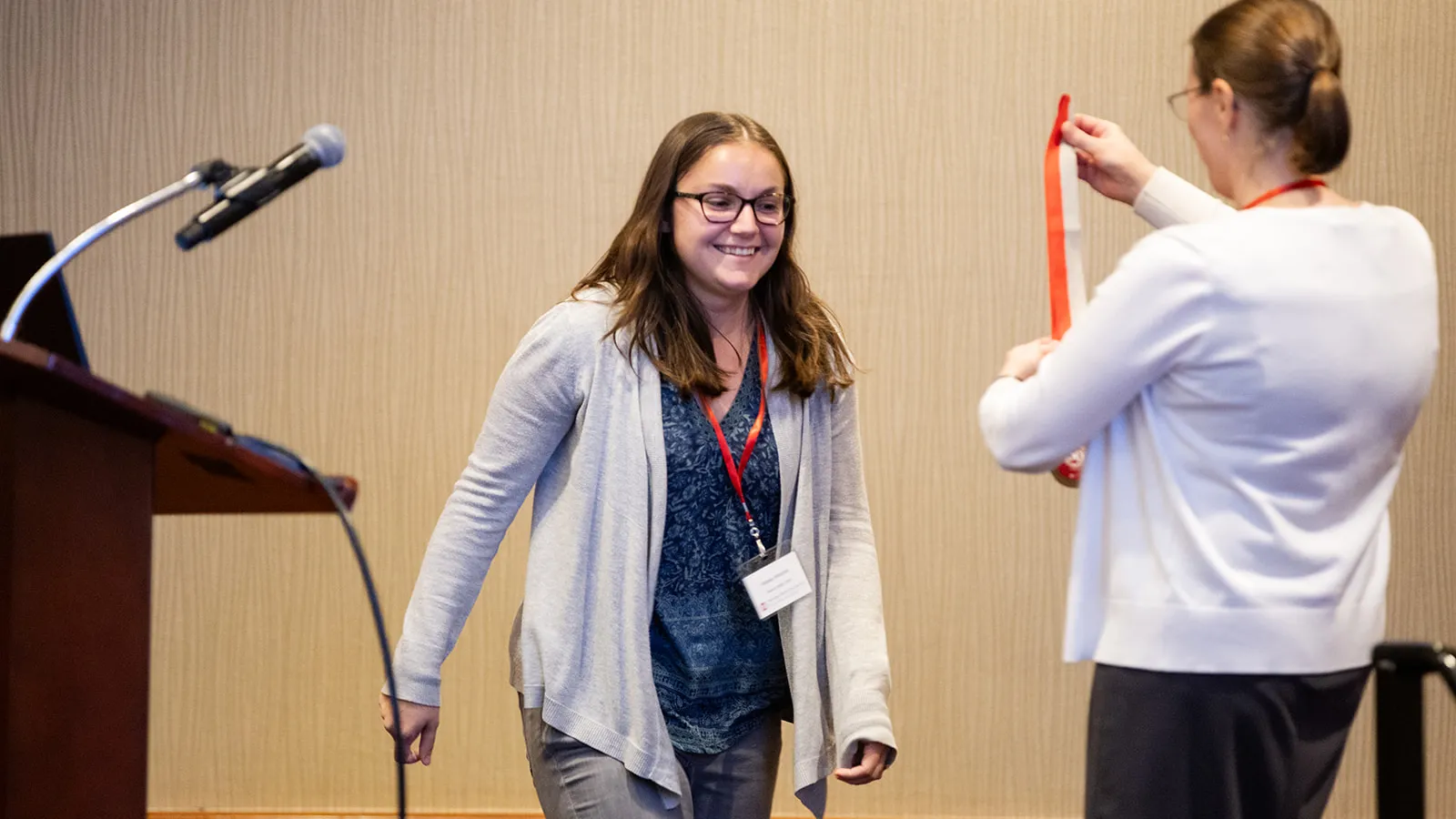 Alyssa Antonini being presented with a bronze medal
