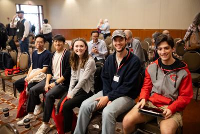 students attending a department conference session