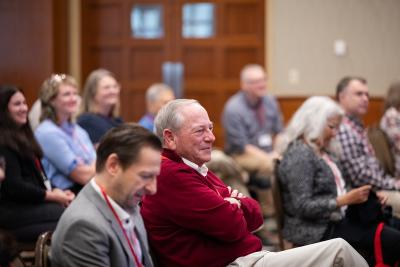 audience members listening to a panel session