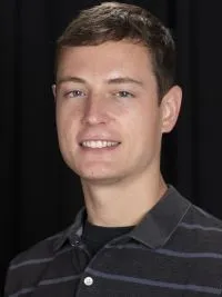 A headshot of Patrick McHugh