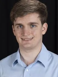 A headshot of Torey Hilbert