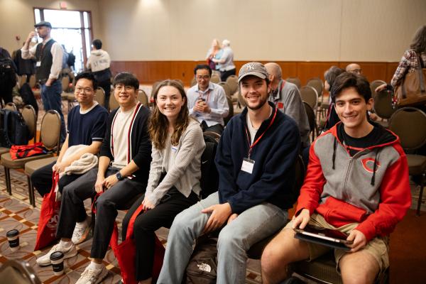 students attending a department conference session