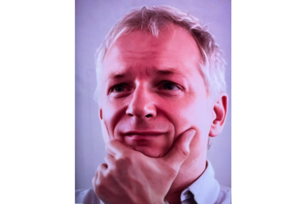 Man with hand on chin.