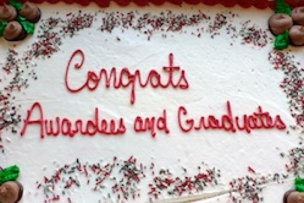 Spring awards picnic cake Cake that says "Congrats Awardees and Graduates"
