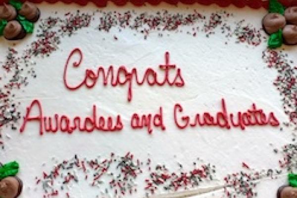 Cake that says "Congrats Awardees and Graduates" 