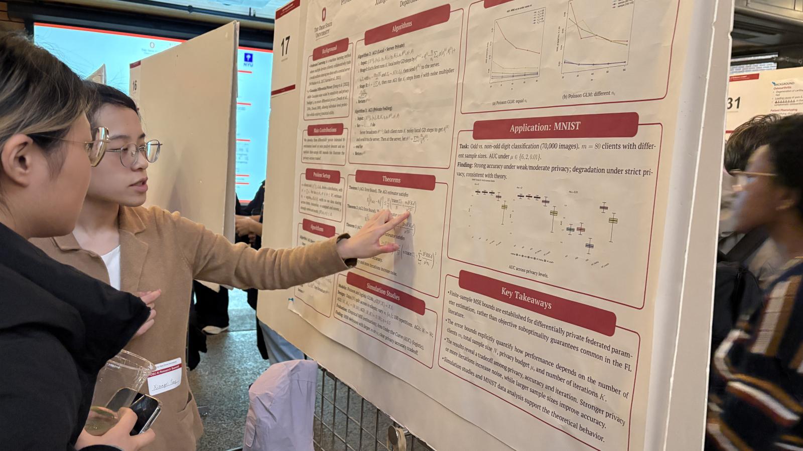 students reviewing project boards